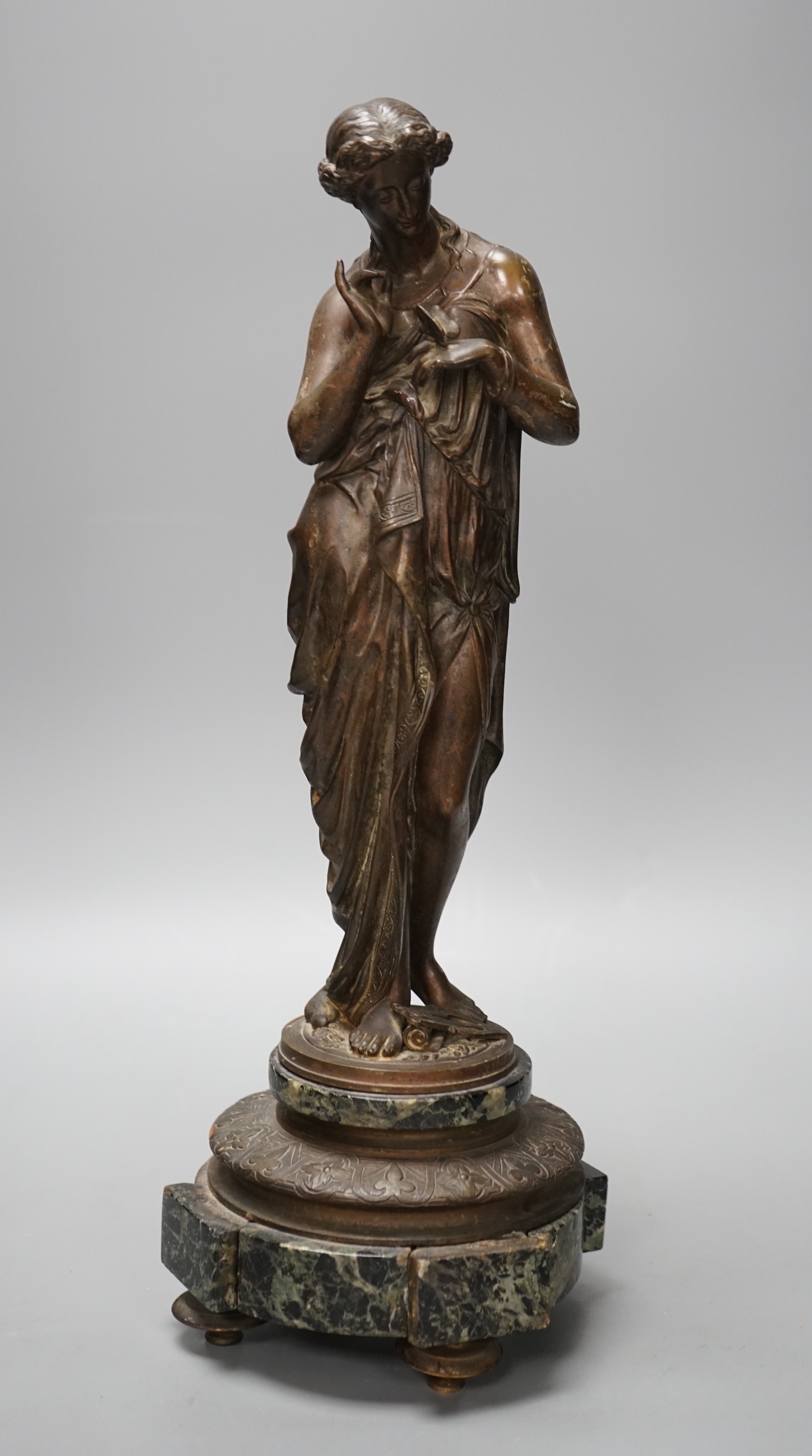 Émile Louis Picault (1833-1915), a bronze of a classical figure holding a butterfly, on marble base, 39cm